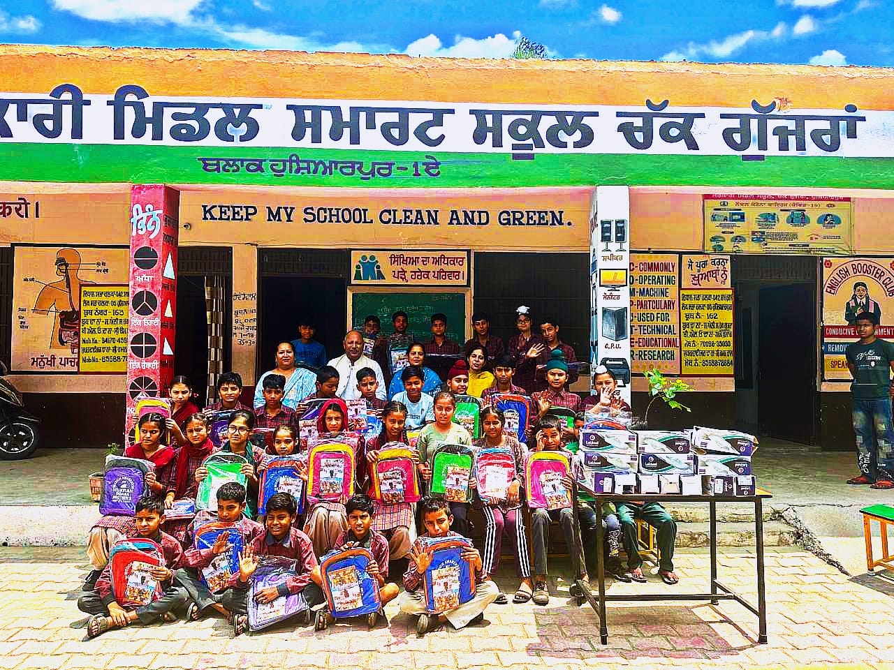 Inspector Ram Dayal distributed kits and shoes to the children of Government Middle School Chak Gujjar.